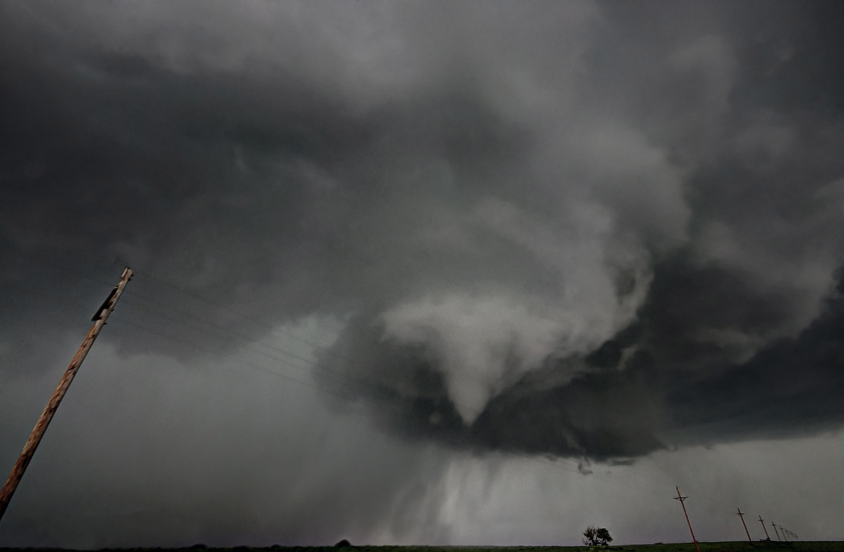 Rotation-A tornado briefly touches down near Wellington Kansas.