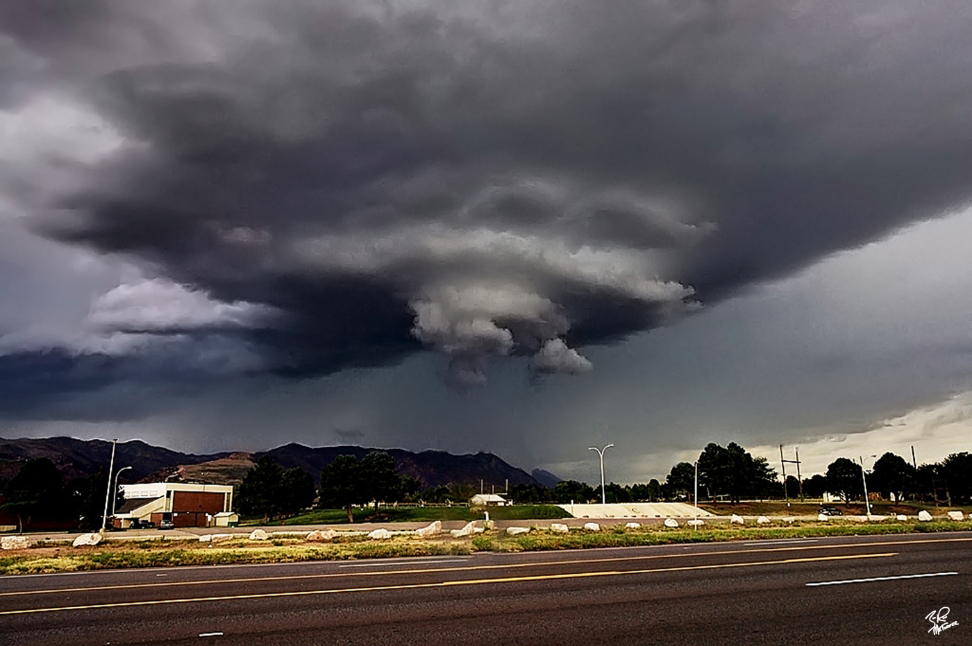 Up until this day in June of 2012 I had not seen a tornado warned storm with intense rotation so close to the Rocky Mountains. This storm nearly put a tornado down and the sight of it spinning West of Colorado Springs was incredible. 